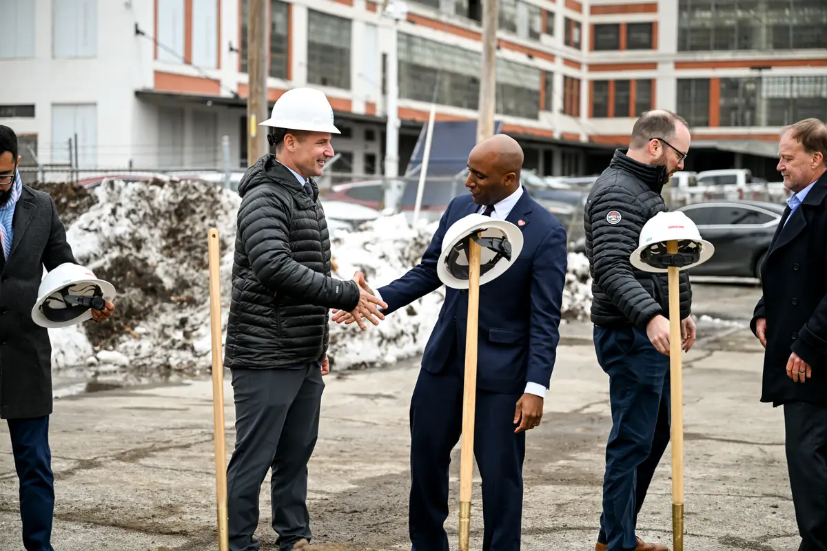 Attendees mingling after the Historic Northeast Lofts groundbreaking ceremony