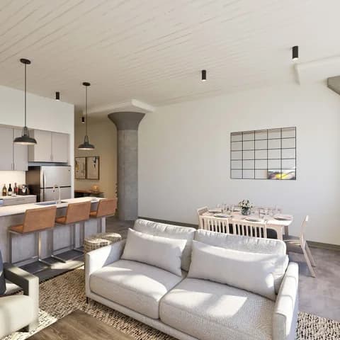 Living area in a one-bedroom home at Historic Northeast Lofts